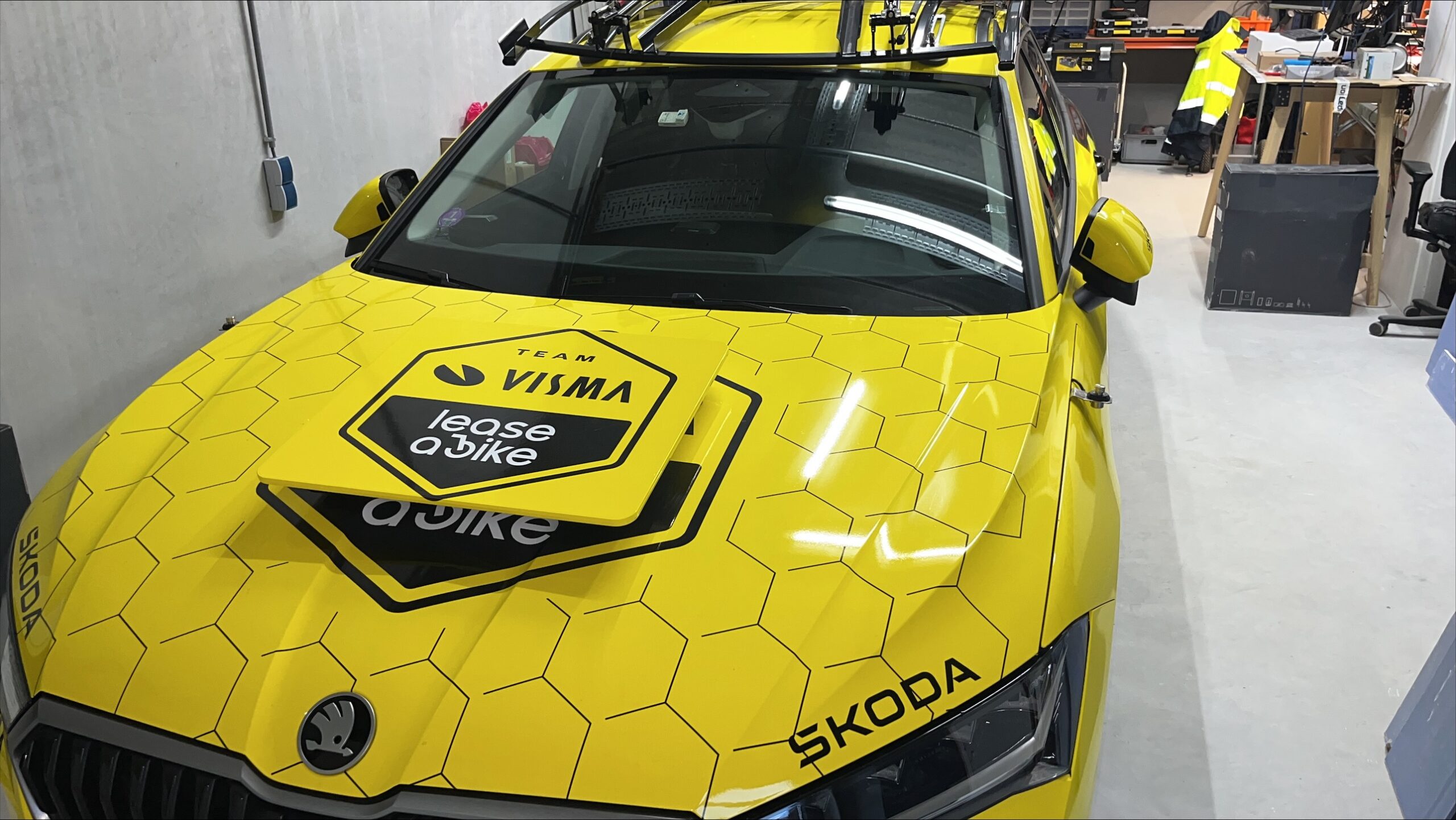 Skoda Visma | Lease a Bike in the workshop for installing Starlink antenna on the hood
